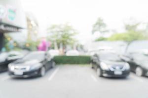 abstraktes verschwommenes Parkauto für den Hintergrund foto