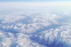 Schnee bedeckt bergig Terrain. generativ ai foto