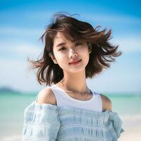schön asiatisch Mädchen genießen Sommer- im das Strand ai generativ foto