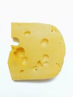 Stück von Käse auf ein Weiß Hintergrund foto