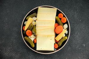 Raclette Käse lecker Mahlzeit Gemüse Essen Kochen Vorspeise Mahlzeit Essen Snack auf das Tabelle foto