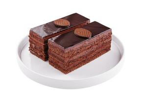 schließen oben von zwei Stücke von Schokolade Kuchen auf Teller foto