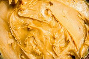 Erdnuss Butter Textur . foto