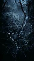 ein abstrakt Bild von ein Baum mit Geäst im das dunkel generativ ai foto