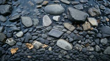 Felsen und Kies im das Wasser generativ ai foto