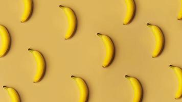 Hintergrund aus Bananen in Folge auf goldenem Hintergrund foto