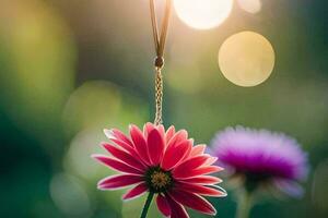 ein Rosa Blume ist hängend von ein Halskette. KI-generiert foto