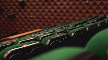 Vintage-Kino-Theater-Filme Publikum Retro-Sitzplätze, grün