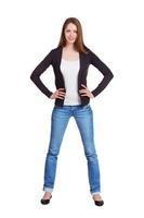 elegantes schlankes Mädchen in Blue Jeans foto