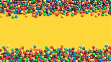 doppelt Rand von bunt beschichtet Schokolade Süßigkeiten auf Gelb Hintergrund foto