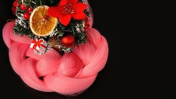 synthetisches rosa Kanekalon - Weihnachtsfoto foto