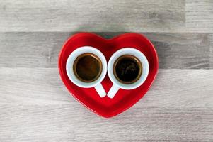 Valentinstag Herzuntertasse mit Tasse Kaffee