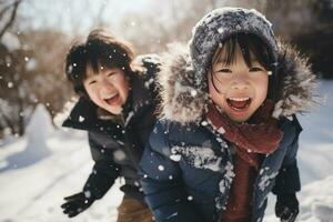 asiatisch Kinder spielen im das Schnee auf Winter Tag. Kinder Lachen und haben Spaß während spielen draußen mit Schnee. generativ ai. foto