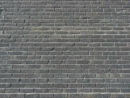 dunkel braun Backstein Mauer Hintergrund foto