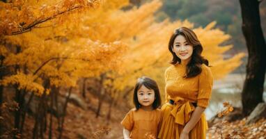 asiatisch Mutter und ihr wenig Tochter posieren im Natur auf ein Herbst Tag. generativ ai foto