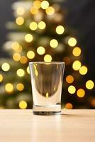 leer Glas Schuss zum alkoholisch Getränke mit verwischen Weihnachten Hintergrund Attrappe, Lehrmodell, Simulation ai generiert foto