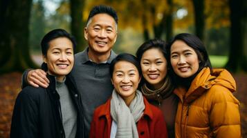 asiatisch mittleren Alters Familie posiert glücklich. generativ ai foto