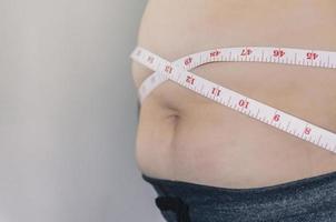 menschlichen Körper und Fettkörper, Bauch oder Bauch und Übergewicht von Menschen. foto