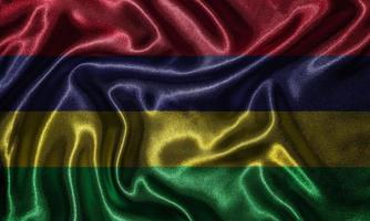 Tapete von Mauritius-Flagge und wehende Flagge von Stoff. foto