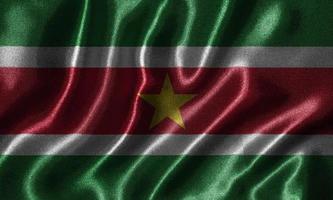Tapete von Surinam-Flagge und wehende Flagge von Stoff. foto