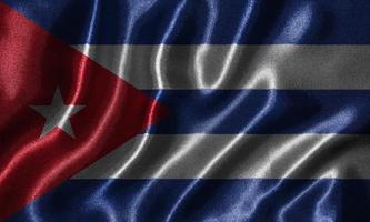 Tapete von Kuba-Flagge und wehende Flagge von Stoff. foto