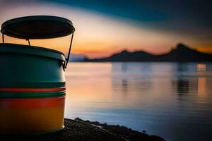 ein Eimer Sitzung auf das Ufer von ein See beim Sonnenuntergang. KI-generiert foto