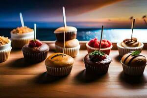 ein Tabelle mit Cupcakes und andere Nachspeisen auf Es. KI-generiert foto