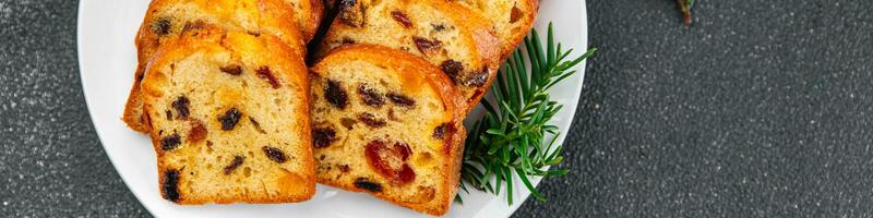 Obst Kuchen Süss Dessert Gebäck getrocknet Früchte Kirsche, getrocknet Aprikose, prune, Rosine Weihnachten Süss Dessert Urlaub behandeln Neu Jahr und Weihnachten Mahlzeit Essen Snack auf das Tabelle Kopieren Raum Essen Hintergrund foto