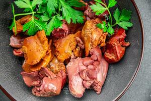 Hähnchen Leber Confit Snack Mahlzeit Hähnchen Innereien Essen Vorspeise Essen auf das Tabelle Kopieren Raum Essen foto