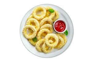 Zwiebel Ringe tief Friteuse Tomate Soße schnell Essen Essen Kochen Mahlzeit Essen Snack auf das Tabelle Kopieren Raum Essen Hintergrund rustikal oben Aussicht foto