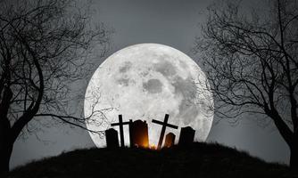 Halloween-Hintergrund eines Friedhofs mit Vollmond foto