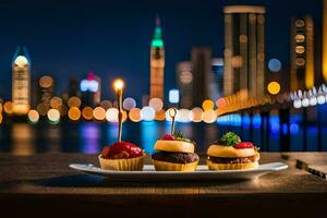 drei Mini Cupcakes auf ein Teller mit ein Stadt Horizont im das Hintergrund. KI-generiert foto