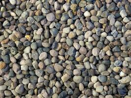 Hintergrund ein Menge von klein Steine, ai generativ foto