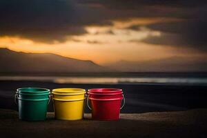 drei bunt Eimer auf das Strand beim Sonnenuntergang. KI-generiert foto