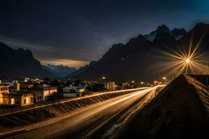 ein lange Exposition fotografieren von ein Straße und Berge beim Nacht. KI-generiert foto