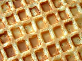 Waffel mit Honig, schließen oben foto