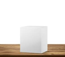 leeren Box Produkt Verpackung Box Attrappe, Lehrmodell, Simulation auf ein hölzern Tisch, Weiß Hintergrund. foto