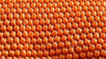 Orange Fußball Stoff Textur mit Luft Gittergewebe. sportlich tragen Hintergrund foto