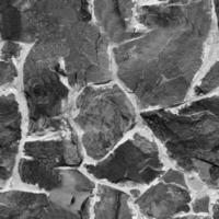 nahtlos Stein Muster. alt Stein Mauer schwarz und Weiß einfarbig Textur foto