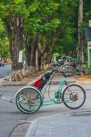 Rikscha lokal Transport zum Touristen. im Vietnam foto