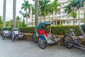 Rikscha lokal Transport zum Touristen. im Vietnam foto