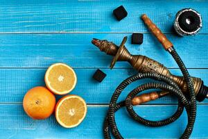 Tabak Hintergrund. Türkisch Rauchen Huka mit Tabak Geschmack von reif Orange foto