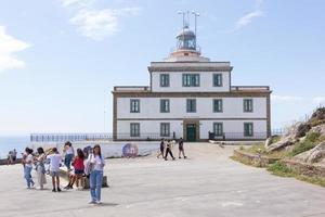 Leuchtturm in Finisterre, Weltuntergang am Atlantik in Galicien, Spanien foto