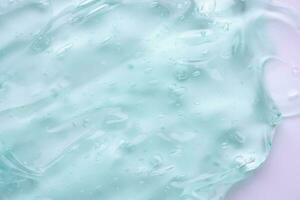 transparent klar Blau Flüssigkeit Serum Gel kosmetisch Textur Hintergrund foto