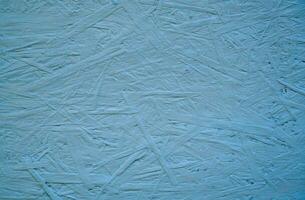 Panel gemacht von gedrückt Holz Sägespäne, gemalt Blau. hölzern Textur. foto