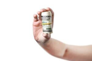 ein Hand zeigt an ein rollen von Geld isoliert auf Weiß Hintergrund 100 Dollar foto