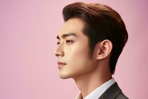 Porträt von ein schön jung asiatisch Mann auf Rosa hintergrund.asiatisch Schönheit ai generiert foto
