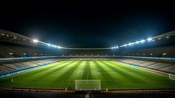 Fußball Stadion beim Nacht mit hell Beleuchtung foto