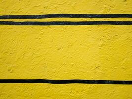 Gelb gemalt Zement Mauer Hintergrund foto