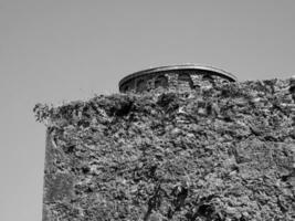 uralt Turm Mauer Hintergrund, Geschwätz Schloss im Irland, keltisch Festung foto